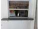View to the pool outside of the kitchen window at 3278 Cabaret St, Port Charlotte, FL 33948
