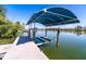 Boat lift and dock provide access to waterfront activities at 342 S Gulf Blvd, Placida, FL 33946