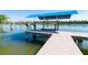 A private dock with a boat lift provides easy access to the water at 342 S Gulf Blvd, Placida, FL 33946