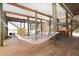 Relaxing ground-level featuring a hammock, bar, seating, and waterfront access enhancing the outdoor lifestyle at 342 S Gulf Blvd, Placida, FL 33946