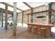 Outdoor bar area on the ground level, perfect for entertaining with seating and waterfront views at 342 S Gulf Blvd, Placida, FL 33946