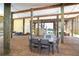 Spacious ground level with dining, seating, and easy waterfront access, ideal for outdoor relaxation at 342 S Gulf Blvd, Placida, FL 33946