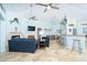 Open living area with bar seating, nautical decor, and dining space at 342 S Gulf Blvd, Placida, FL 33946
