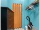 A cozy closet with a dresser, folding door, and hanging storage for all your storage needs at 3586 Cape Haze N Dr # B6, Rotonda West, FL 33947