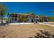 Condos with patio, tables and chairs, lush landscaping and tropical trees at 3586 Cape Haze N Dr # B6, Rotonda West, FL 33947