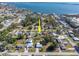 Aerial view of the property nestled in a neighborhood with convenient access to waterfront amenities at 360 W Cowles St, Englewood, FL 34223