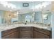Spacious bathroom with granite countertops, a tiled shower, and modern fixtures at 4 Bunker Rd, Rotonda West, FL 33947