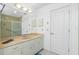Bathroom showing a marble vanity with a shower and toilet area at 4 Bunker Rd, Rotonda West, FL 33947