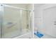 Bathroom featuring a shower and separate toilet room at 4 Bunker Rd, Rotonda West, FL 33947