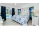 Comfortable bedroom with blue accents, pool view, and modern furnishings at 4 Bunker Rd, Rotonda West, FL 33947