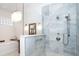 Luxurious bathroom featuring a glass enclosed shower and soaking tub at 5 Saint John Blvd, Englewood, FL 34223