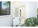 Exterior view of a door leading to an outside shower at 5 Saint John Blvd, Englewood, FL 34223