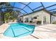 A private pool is surrounded by a screened lanai and an outdoor living area at 5 Saint John Blvd, Englewood, FL 34223