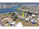Enjoy waterfront views from this home in Lemon Bay Isles, a 55+ community near beautiful lakes at 6168 Partridge Ave, Englewood, FL 34224