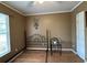 Cozy bedroom with hardwood floors, a window, and a ceiling fan, creating a comfortable and inviting space at 67 Marker Rd, Rotonda West, FL 33947