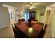 Open dining room featuring an adjacent view into the kitchen and living spaces at 67 Marker Rd, Rotonda West, FL 33947