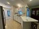 Functional kitchen featuring bright white cabinetry and lots of counter space at 67 Marker Rd, Rotonda West, FL 33947