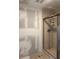 Bathroom under construction with an enclosed shower and tiled walls awaiting completion at 6800 Placida Rd # 227, Englewood, FL 34224