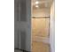 Bathroom featuring a tub and shower wrapped in plastic prior to the completion of construction at 6800 Placida Rd # 227, Englewood, FL 34224