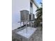 The property's exterior HVAC units installed on a concrete pad at 6800 Placida Rd # 227, Englewood, FL 34224