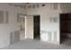 Spacious living room with fresh drywall and multiple entryways at 6800 Placida Rd # 227, Englewood, FL 34224