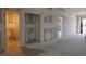 Living room featuring several doors and doorways throughout, awaiting final touches at 6800 Placida Rd # 227, Englewood, FL 34224