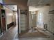 Kitchen with exposed studs, open pantry, and protective floor covering at 6800 Placida Rd # F294, Englewood, FL 34224