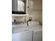 Laundry room featuring a modern washer and dryer at 6800 Placida Rd # F294, Englewood, FL 34224
