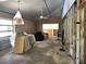 Living room featuring new ceiling fan, couch, window, and the layout before the renovation is complete at 6800 Placida Rd # F294, Englewood, FL 34224