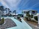 Enjoy a refreshing swim in the community pool, surrounded by lush landscaping at 6800 Placida Rd # F294, Englewood, FL 34224