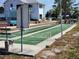 Enjoy outdoor activities with well-maintained shuffleboard courts and seating areas at 6800 Placida Rd # F294, Englewood, FL 34224