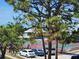 Tennis courts are conveniently located near residential buildings and parking spaces at 6800 Placida Rd # F294, Englewood, FL 34224