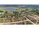 Beautiful aerial view showcasing a lake and golf course in the neighborhood at 7360 David Blvd, Port Charlotte, FL 33981