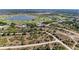 Beautiful aerial view showcasing a lake and golf course in the neighborhood at 7360 David Blvd, Port Charlotte, FL 33981