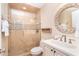 Bathroom featuring a glass walk-in shower and ample counter space at 7536 Palm Island S Dr # 1522, Placida, FL 33946