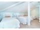 Bright bedroom with three twin beds, perfect for Gathering or guests, featuring clean design and comfortable bedding at 7536 Palm Island S Dr # 1522, Placida, FL 33946