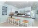 Well-equipped kitchen with ample counter space and adjacent seating, perfect for casual dining at 7536 Palm Island S Dr # 1522, Placida, FL 33946