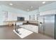 Updated kitchen featuring stainless steel appliances and white cabinetry, offering a modern, clean look at 7536 Palm Island S Dr # 1522, Placida, FL 33946