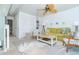 Cozy living room features a comfortable green sofa, stylish coastal décor, and a welcoming atmosphere at 7536 Palm Island S Dr # 1522, Placida, FL 33946