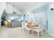 Inviting living space with dining area, comfortable seating, and beautiful view from the window at 7536 Palm Island S Dr # 1522, Placida, FL 33946