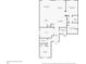 Floor plan featuring kitchen, living room, primary bedroom, den, laundry room, and bathroom at 7620 Raptor Ct, North Port, FL 34287