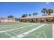 Outdoor shuffleboard courts for recreation with a covered social area at 809 Tangerine Woods Blvd # 215, Englewood, FL 34223