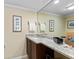 Bathroom features granite counters and decorative towels, mirror and decor at 11000 Placida Rd # 2702, Placida, FL 33946