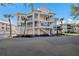 Beautiful three-story condo building with multiple balconies offering stunning waterfront views at 11000 Placida Rd # 2702, Placida, FL 33946