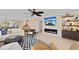 Cozy living room featuring a fireplace, comfortable seating, and modern decor at 11000 Placida Rd # 2702, Placida, FL 33946