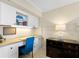 Well-lit study featuring built-in shelving and a comfortable work space at 11000 Placida Rd # 2702, Placida, FL 33946