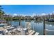 Waterfront view with boat docks showcasing the desirable coastal lifestyle at 11000 Placida Rd # 2702, Placida, FL 33946