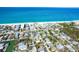 Lovely beach home in a desirable location, with beautiful sand and ocean views, surrounded by palms at 130 Sand Dollar Ln, Englewood, FL 34223