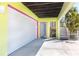 Spacious garage with direct access to the home and storage space at 130 Sand Dollar Ln, Englewood, FL 34223