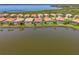 Aerial shot of lakefront homes with screened pools at 13000 N Marsh Dr, Port Charlotte, FL 33953